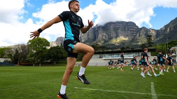 22 September 2025; Sam Prendergast warms up in front of a backdrop of Table Mountain during a Leinster rugby squad training session at SACS High School in Newlands, Cape Town, South Africa. Photo by Shaun Roy/Sportsfile
