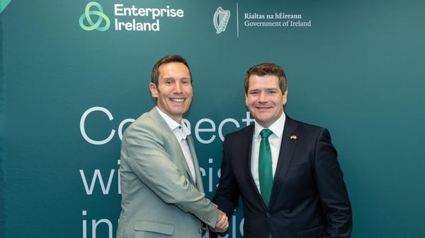 Mark Rohan shakes hands with Minister Peter Burke at Enterprise Ireland event