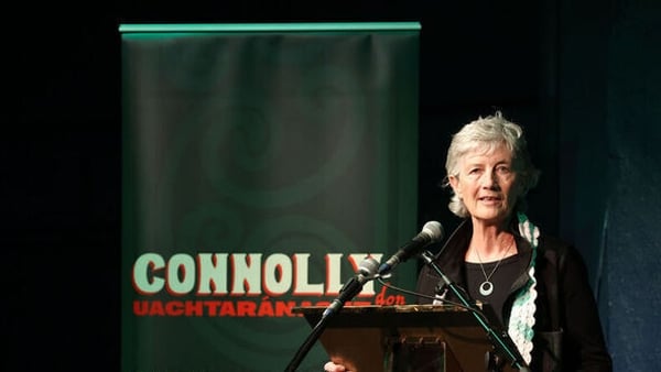 Catherine Connolly speaks from a podium at her campaign launch in Dublin