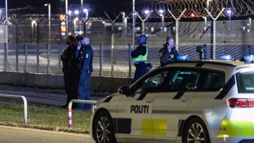 Danish police are seen at Copenhagen Airport during the closure