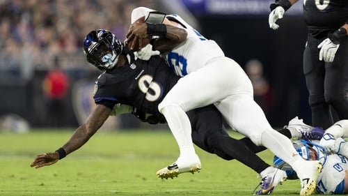 Lamar Jackson of the Baltimore Ravens is sacked by the Detroit Lions defence
