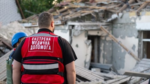 Ukrainian emergency workers on the scene following a Russian attack on Zaporizhzhia this week