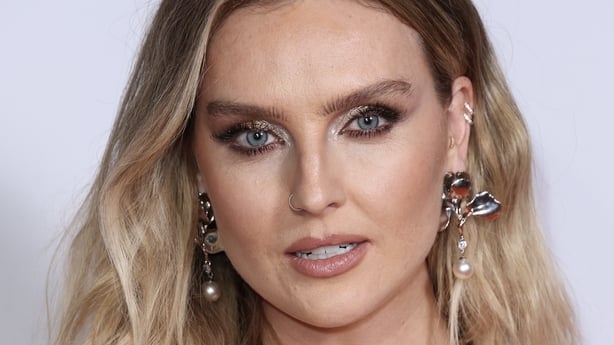Perrie Edwards poses for a photo on the red carpet