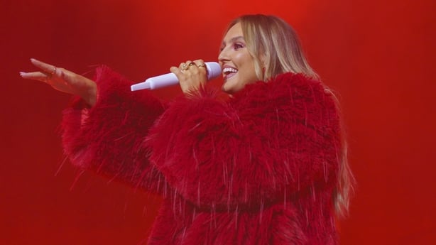 Perrie Edwards performing onstage
