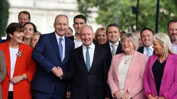 Jim Gavin with members of Fianna Fáil after being chosen as the party's presidential candidate