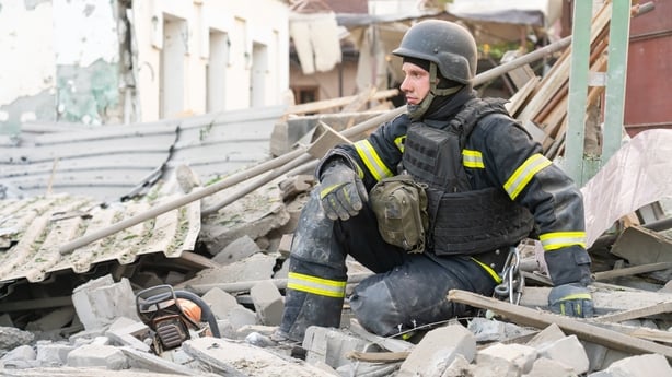 ZAPORIZHZHIA, UKRAINE - SEPTEMBER 22: (----EDITORIAL USE ONLY - MANDATORY CREDIT - ' ZAPORIZHZHIA REGIONAL MILITARY ADMINISTRATION / HANDOUT' - NO MARKETING NO ADVERTISING CAMPAIGNS - DISTRIBUTED AS A SERVICE TO CLIENTS----) Ukrainian firefighters work on the scene following the Russian attack on Za