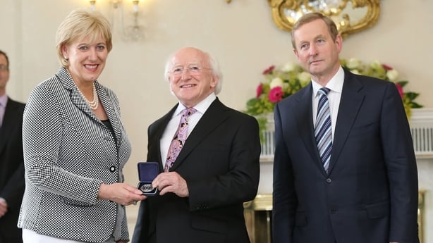 Taoiseach Enda Kenny and President Michael D Higgins congratulate Heather Humphreys on her appointment as Art Heritage and Gaeltacht minister at Aras an Uachtarain, Dublin after today's Cabinet reshuffle. PRESS ASSOCIATION Photo. Picture date: Friday July 11, 2014. See PA story POLITICS reshuffle. P