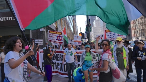 Pro-Palestine protestors gather in front of the New York Public Library 