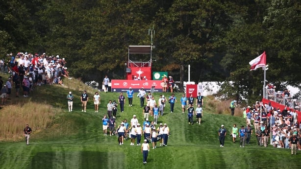 New York , United States - 23 September 2025; Players including Rory McIlroy, Shane Lowry, Tommy Fleetwood and Justin Rose walk up the 18th fairway during a practice round before the 2025 Ryder Cup at Black Course at Bethpage State Park Golf Course in Farmingdale, New York, USA. (Photo By Vaughn Rid