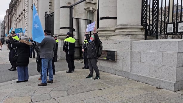Members of the Uyghur community protesting