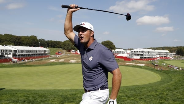 FARMINGDALE, NEW YORK - SEPTEMBER 23: Bryson DeChambeau of Team United States acknowledges the crowd while playing the 18th hole prior to the Ryder Cup 2025 at Black Course at Bethpage State Park Golf Course on September 23, 2025 in Farmingdale, New York.