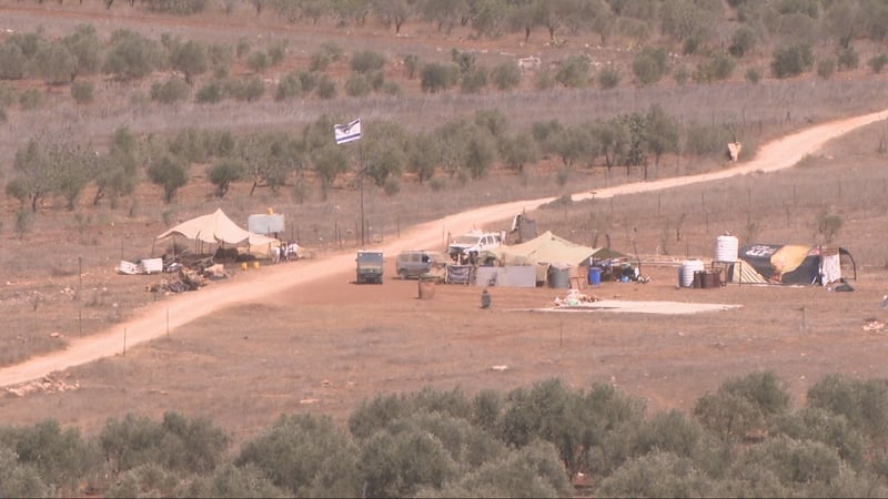 An Israeli outpost in the West Bank, which a local said has increased to include two tents