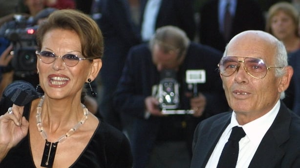 Italian actress Claudia Cardinale and her partner Pasquale Squitieri at the opening of the exhibition The Scene of the Prince-Visconti and the Leopard, held at Palazzo Chigi in Ariccia, Italy on 12 October 2001