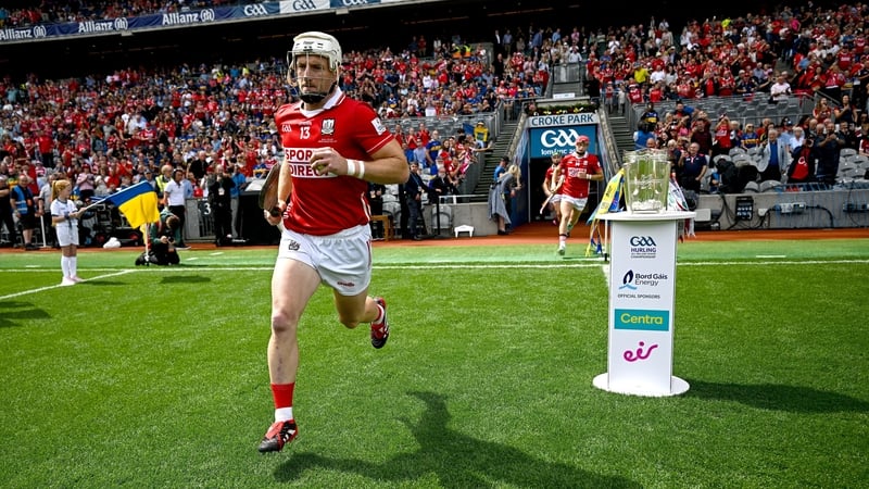 Patrick Horgan runs onto the pitch past the Liam MacCarthy cup before the All-Ireland final defeat to Tipperary