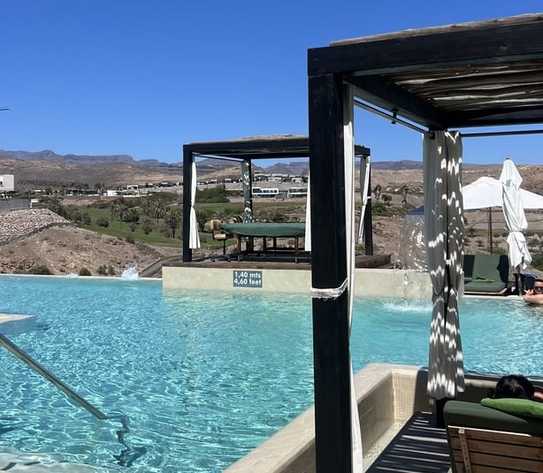 A view of swimming pools and blue skies