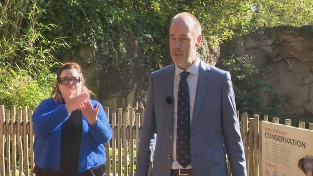 Director of Dublin Zoo Dr Christoph Schwitzer speaks to the reporter while an interpreter signs his answers