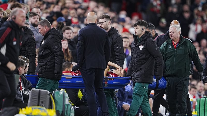 Giovanni Leoni being stretchered off the field of play at Anfield