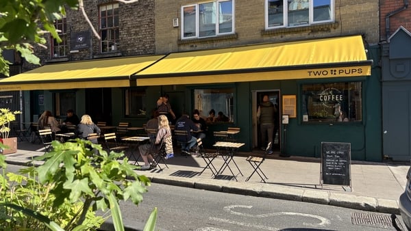 An exterior shot of Two Pups cafe in the Liberties