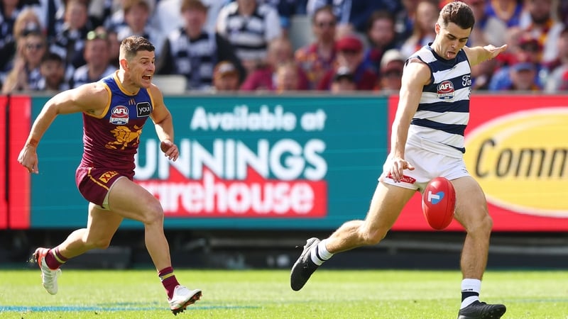 Oisín Mullin of the Geelong Cats kicks a goal during the AFL Grand Final against Brisbane Lions