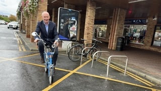 Jim Gavin seen on a small bicycle