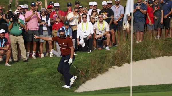 FARMINGDALE, NY - SEPTEMBER 27: Jon Rahm of Team Europe reacts to making his chip shot on the eighth hole during the 2025 Ryder Cup on the Black Course at Bethpage State Park on Saturday, September 27, 2025 in Farmingdale, New York. (Photo by Scott Taetsc
