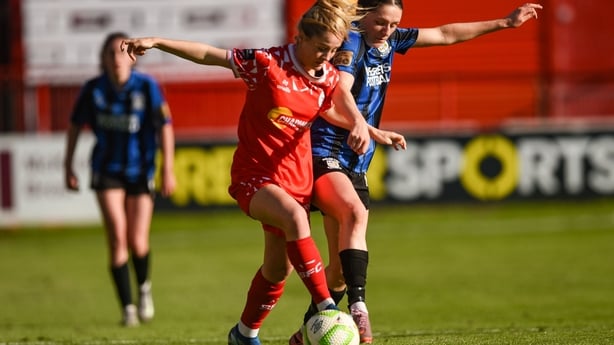 Lucy O'Rourke of Shelbourne is tackled by Roisin Molloy of Athlone Town during the SSE Airtricity Women's Premier Division match between Shelbourne and Athlone Town at Tolka Park in Dublin.