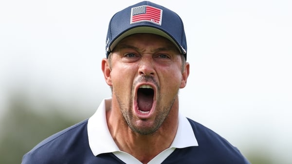 FARMINGDALE, NEW YORK - SEPTEMBER 27: Bryson DeChambeau of Team United States reacts after making his putt to win the 11th hole during the Saturday afternoon four-balls matches of the 2025 Ryder Cup at Black Course at Bethpage State Park Golf Course on Se
