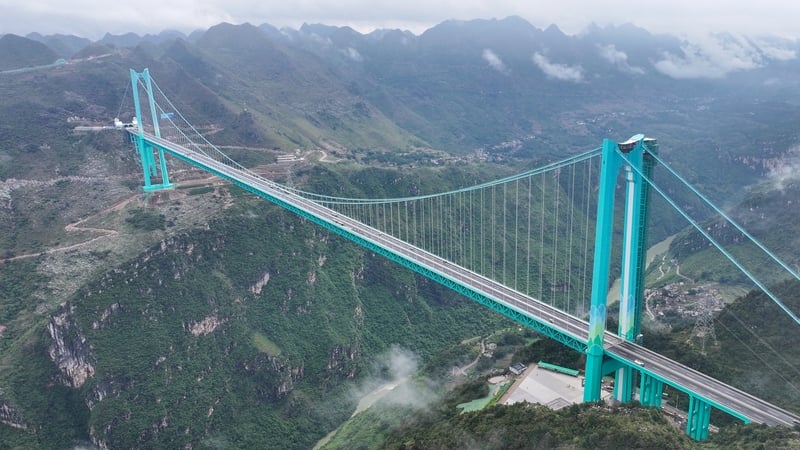 The Huajiang Grand Canyon Bridge towers 625m above a river and vast gorge in the country's rugged southern province of Guizhou