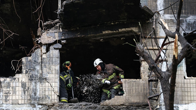 At least four people were killed in an attack on Kyiv overnight