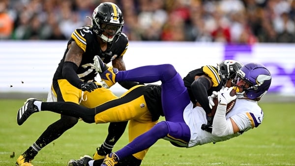 28 September 2025; Wide receiver Adam Thielen #19 of Minnesota Vikings is tackled by Cornerback Brandin Echols #26 of Pittsburgh Steelers during the 2025 NFL International Game between the Pittsburgh Steelers and the Minnesota Vikings at Croke Park in Dub