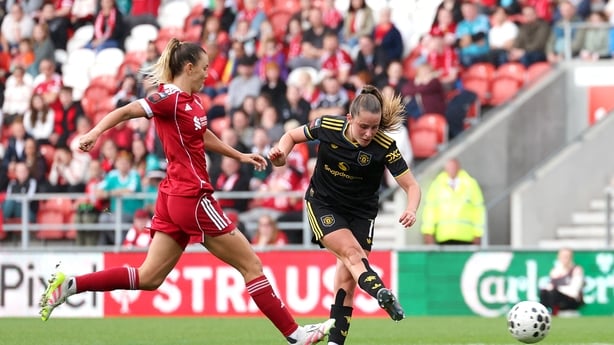 Ella Toone of Manchester United (r) scores against Liverpool - September 2025