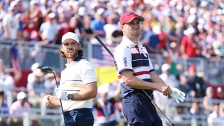 FARMINGDALE, NEW YORK - SEPTEMBER 28: (L-R) Matt Fitzpatrick of Team Europe and Justin Thomas of Team United States look on from the first tee during the Sunday singles matches of the 2025 Ryder Cup at Black Course at Bethpage State Park Golf Course on Se