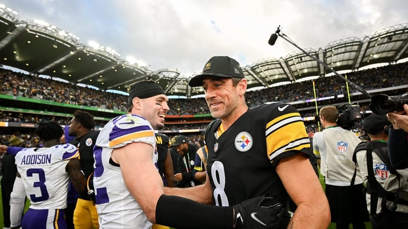 Quarterback Aaron Rodgers #8 of Pittsburgh Steelers and Safety Harrison Smith #22 of Minnesota Vikings after the 2025 NFL International Game between the Pittsburgh Steelers and the Minnesota Vikings at Croke Park in Dublin.
