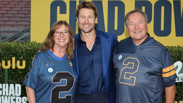 Glen Powell and his parents Cyndy and Glenn Sr attend the red carpet premiere of Chad Powers at Rose Bowl Stadium on 25 September, 2025 in Pasadena, California