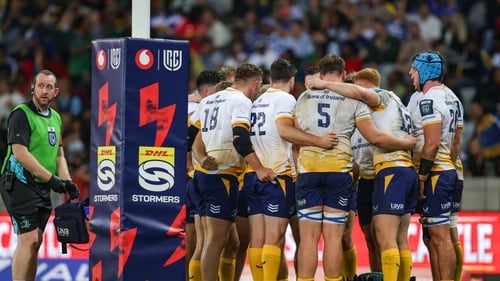 Leinster players huddle after conceding a try against the Stormers