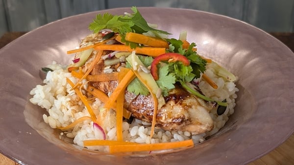 A bowl of chicken curry with vegetables