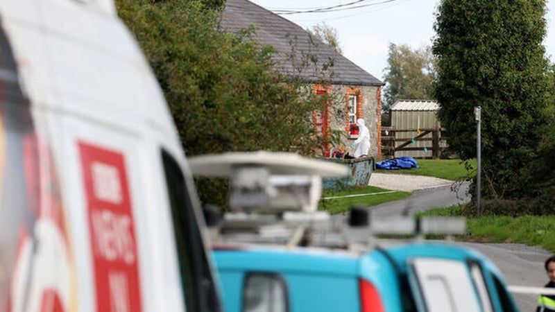 Some neighbours visited the scene, standing forlornly at the crime tape preventing access to the cottage (Photo: RollingNews.ie)