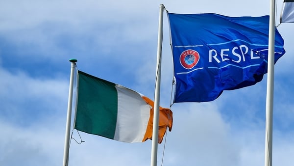 The flags of Republic of Ireland, UEFA and Estonia are seen before the UEFA European Under-19 Championship Elite Round match between Republic of Ireland and Estonia at Ferrycarrig Park in Wexford.