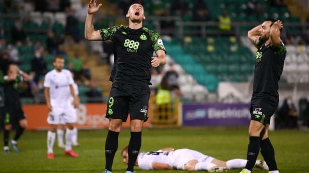 Aaron Greene, left, and Richie Towell of Shamrock Rovers react to a missed opportunity on goal during the UEFA Europa Conference League play-off second leg match between Shamrock Rovers and Flora Tallinn at Tallaght Stadium in Dublin.
