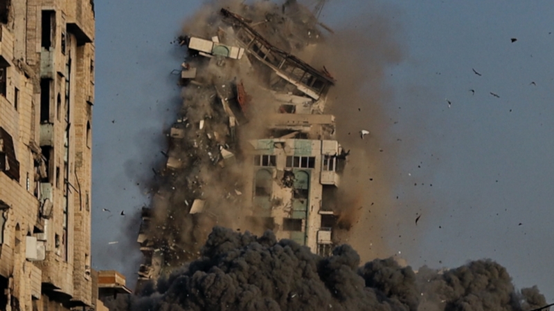 Israeli army missiles strike the high-rise 'Mekka Tower' in Gaza City's Rimal neighbourhood