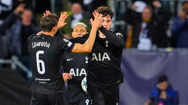 Tottenham Hotspur's English midfielder #14 Archie Gray celebrates with team mates after contributing to Bodoe/Glimt's own goal during the UEFA Champions League, League Phase - Matchday 2 football match between Bodoe/Glimt and Tottenham Hotspur in Bodoe, Norway on September 30, 2025. (Photo by Lise Å