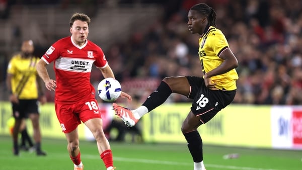 MIDDLESBROUGH, ENGLAND - SEPTEMBER 30: Aidan Morris of Middlesbrough challenges Bosun Lawal of Stoke during the Sky Bet Championship match between Middlesbrough and Stoke City at Riverside Stadium on September 30, 2025 in Middlesbrough, England. (Photo by