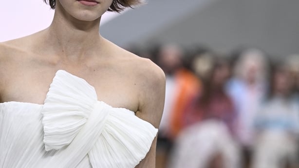 A model presents a creation by Dior