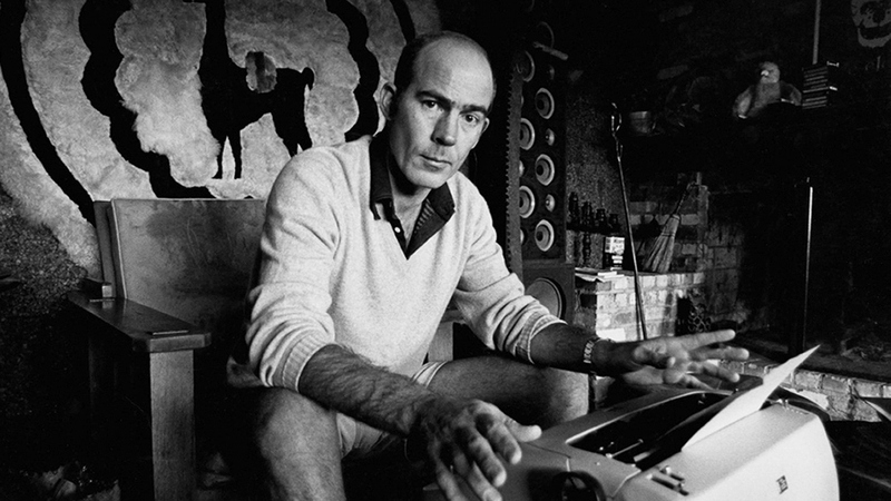 Hunter S. Thompson sits at his typewriter at his ranch circa 1976