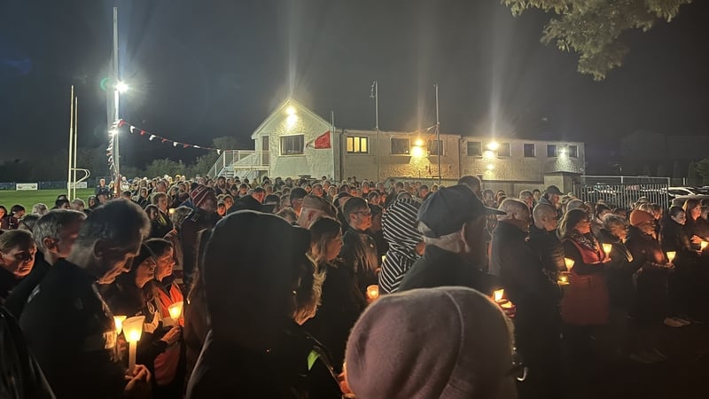 Prayers at a candlelit vigil for Mark, Louise and Evan O'Connor