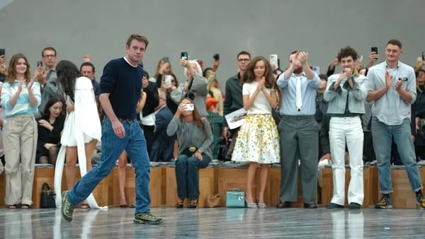 Designer Jonathan Anderson accepted a standing ovation for his Dior debut