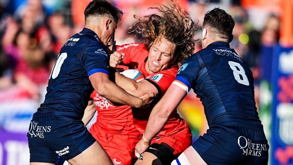 16 May 2025; Werner Kok of Ulster is tackled by Magnus Bradbury and Ross Thompson of Edinburgh during the United Rugby Championship match between Edinburgh and Ulster at Hive Stadium in Edinburgh, Scotland. Photo by Paul Devlin/Sportsfile