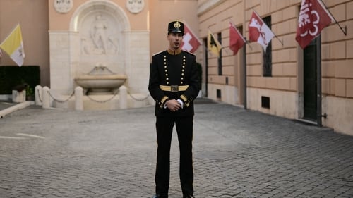 The dark uniform with gold buttons and star-studded epaulettes is an update of its 19-century uniform