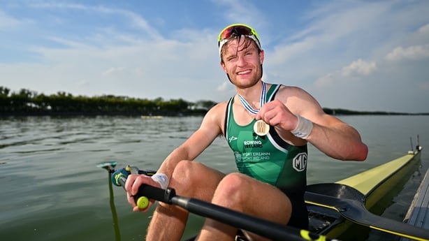 27 September 2025; Jake McCarthy of Ireland with his bronze medal after finishing third in the Men's Lightweight Singles final during the 2025 World Rowing Championships at the Shanghai Water Sports Centre in Shanghai, China. Photo by Benedict Tufnell/Sportsfile 