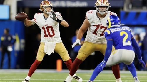 Mac Jones of the San Francisco 49ers throws a pass during the second half